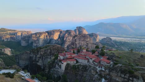 Orbit-around-a-monastery-with-panoramic-view-in-Meteora,-Greece,-aerial