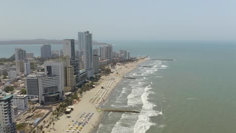 Aerial-View-of-People-Relaxing-on-the-Beach-in-Cartagena,-Colombia