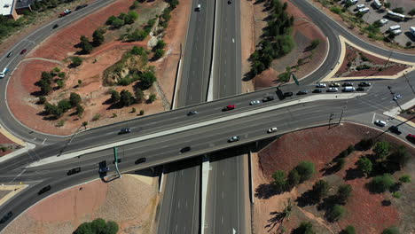 Birdseye-Aerial-View,-Bridge-Overpass-Highway-Traffic-in-Suburbia-of-St