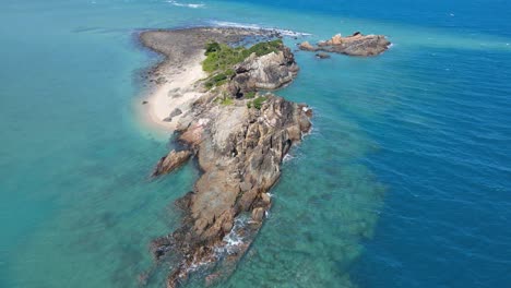 Rocky-Bird-Island-Surrounded-With-Calm-Blue-Sea-Near-Langford-Island-At-Whitsunday-In-Queensland,-Australia