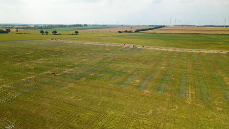Aerial-shot-large-field-prepared-for-installation-of-photovoltaic-panels,-largest-photovoltaic-farm-in-central-europe,-Poland,-Zwartowo
