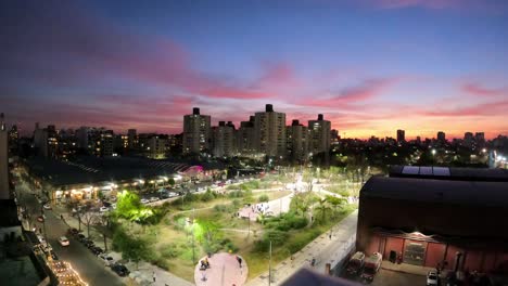Time-lapse-of-nature-park-with-walking-people-during-sunset-in-front-of-skyline-in-Buenos-Aires