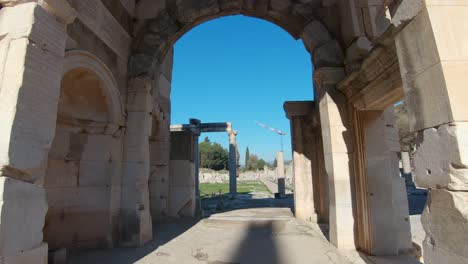 Dolly-shot-through-the-left-arch-of-The-Gate-of-Mazeus-and-Mithridates-in-the-ancient-city-Ephesus