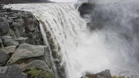 Cinematic-smooth-pull-out-shot-of-the-immense-and-powerful-falls-at-Dettifoss-Iceland