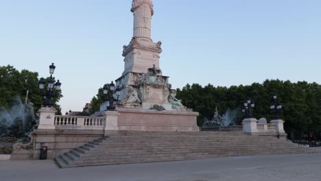 Stairs-at-the-bottom-of-the-Girondains-monument-in-Bordeaux-with-nobody-during-sunrise-in-the-city