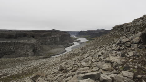 Smooth-dolly-out-landscape-shot-across-the-bleak-wilderness-around-Jokulsa-a-Fjollum-River-Iceland