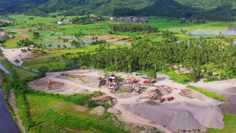 Aerial-View-Of-The-Truck-Vehicles-At-The-Quarry-Plant-At-The-Rural-Area-In-The-Philippines