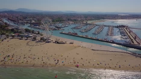 The-Famous-Resort-Of-Rimini,-Ferris-Wheel,-And-Coastline-In-Italy-During-Summertime---aerial-drone-shot