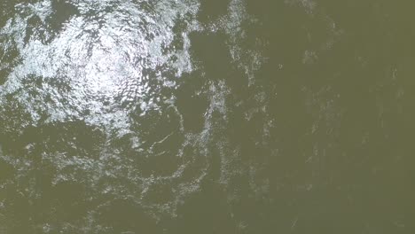 Top-Down-Aerial-View-of-Harsh-Light-Hitting-Water