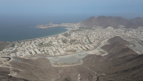Top-view-of-Al-Suhub-Rest-House-in-Khor-Fakkan,-The-new-venue-is-580-metres-above-sea-level-and-offers-panoramic-views-of-Khor-Fakkan,-United-Arab-Emirates