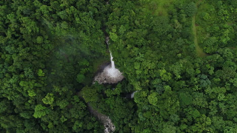 Top-down-aerial-La-Fortuna-waterfall-costa-rica-rain-forest-landscape,-4K