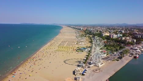 Aerial-View-Of-The-Famous-Resort-And-Ferris-Wheel-In-Rimini,-Italy---drone-shot