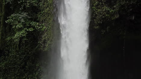 Slow-motion-shot-of-La-Fortuna-Costa-Rica-waterfall-crashing-into-pool-below