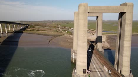 Aerial-View-Of-The-Entire-Structure-Of-Kingsferry-Bridge-Over-The-Swale-Tidal-Channel-In-England