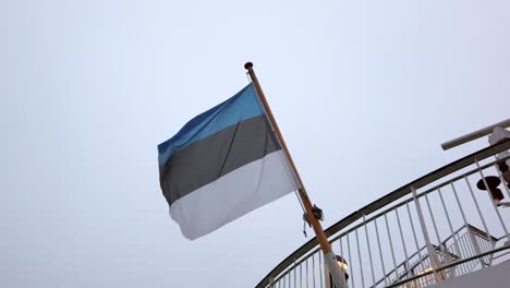 Waving-Estonian-flag-on-the-Tallinn-Helsinki-ferry