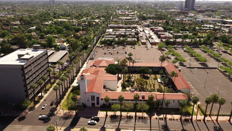 Aerial-View-Of-Central-United-Methodist-Church-With-Traffic-In-Foreground-In-Phoenix,-Arizona,-USA