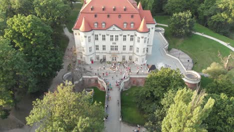 Medieval-Renovated-royal-palace-of-Lesnica,-Poland,-static-aerial-shot