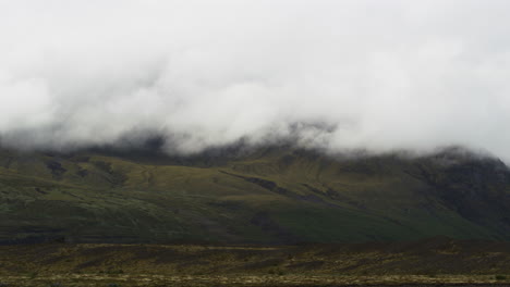 Low-lying-clouds-cover-the-mountainous-peaks-of-the-highland-areas-of-Fjallsárlón-in-Iceland-with-great-cinematic-effect
