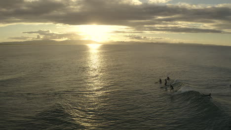 4k-Drone-shot-of-two-surfers-riding-a-wave-together
