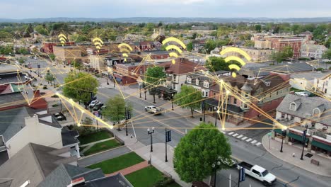 Internet-web-and-data-speed-signals-overlays-small-town-in-USA
