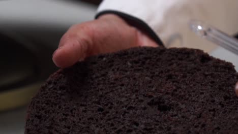 picking-second-layer-of-cake-close-up