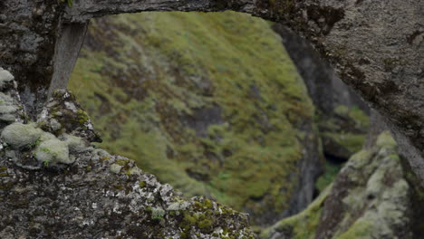 Smooth-steady-abstract-landscape-pullout-shot-over-the-cliffs-of-Fjaðrárgljúfur-Iceland