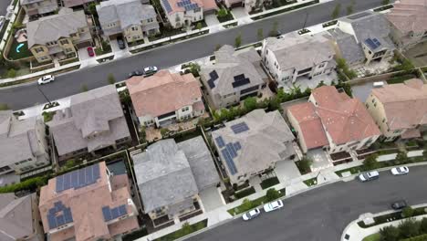 Aerial:-Tustin-new-homes-with-solar-panels,-Los-Angeles-city-suburb,-California