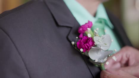 groom-with-boutonniere-in-his-wedding-suit