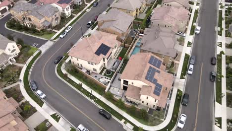 Aerial-circling-over-Tustin-houses-with-solar-panels-installed-on-top-of-roof