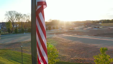 American-flag-during-sunrise,-sunset