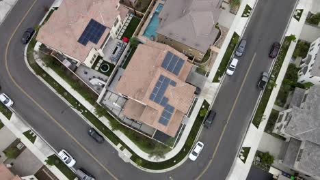 Tustin-home-with-solar-on-roof,-aerial-view,-sustainable-energy