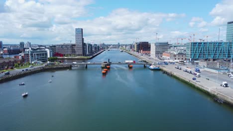 Aerial-approach-to-Tom-Clarke-Bridge-in-Dublin-with-view-over-Dublin