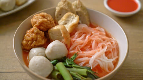 small-flat-rice-noodles-with-fish-balls-and-shrimp-balls-in-pink-soup,-Yen-Ta-Four-or-Yen-Ta-Fo---Asian-food-style