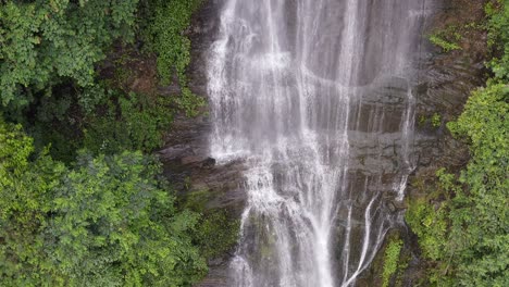 Aerial:-waterfall-cascade-in-Yangshuo-County-karst-mountains