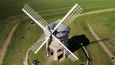 Landmark-Chesterton-historic-wooden-sail-windmill-aerial-orbit-birdseye-right-view-above-rural-English-countryside