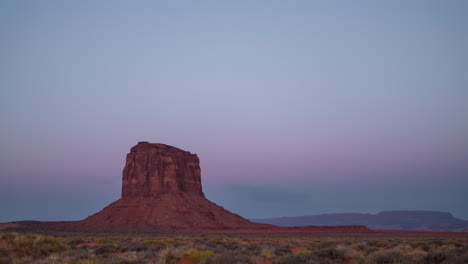 Sunrise-Time-Lapse-Mitchell-Butte-at-Monument-Valley-with-horse-in-frame
