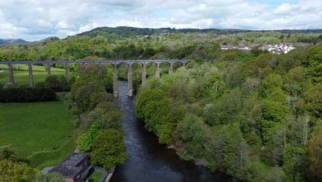 Aerial-view-Pontcysyllte-aqueduct-and-River-Dee-canal-narrow-boat-bride-in-Chirk-Welsh-valley-countryside