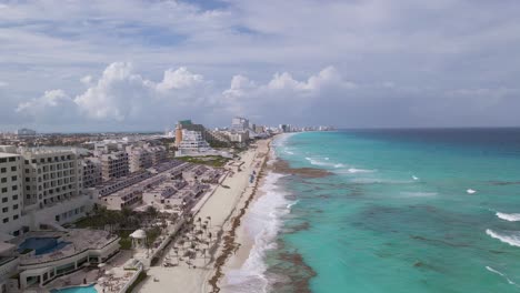 Cancun-Coastline-with-Seaside-Hotel-Resorts-in-Mexico---Aerial