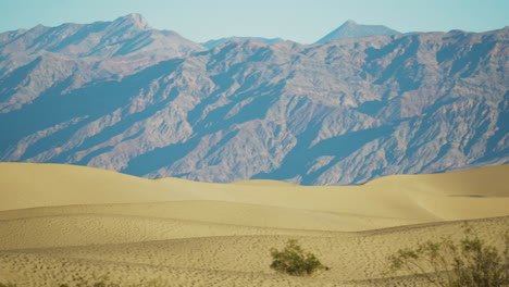 Mesquite-Flat-Sand-Dunes-With-Mountains-In-Distant-Background