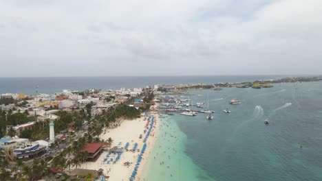 Isla-Mujeres,-popular-Mexican-island-in-Caribbean-Sea,-4K-aerial-view