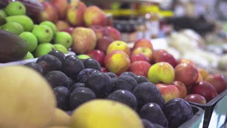 push-out-slow-motion-shot-of-fruit-and-vegetables-in-a-farmer's-market