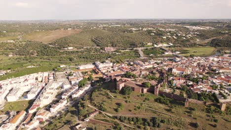 Silves,-Algarve---Panoramic-aerial-view-of-city-and-surrounding-pristine-land