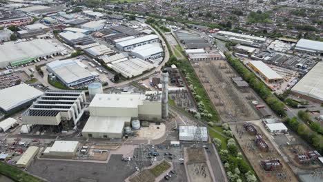 Enfield-Power-station,-Brimsdown,-industrial-estate-in-background-UK-Aerial-footage