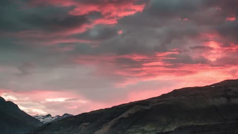 Timelapse-Of-Clouds-Passing-By-Midnight-Sun-In-South-Iceland