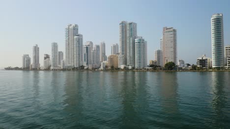 Aerial-Shot-Looking-Up-at-Modern-Skyscrapers-in-Cartagena,-Colombia