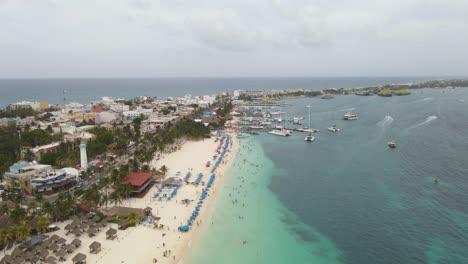 Aerial-View-of-a-beauitful-ocean-resort-in-Isla-Mujeres-in-Mexico,-Pan-Shot