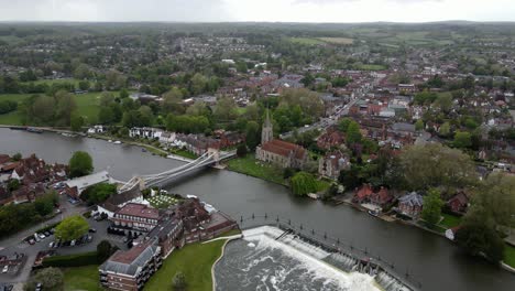 Marlow-town-and-weir-on-river-Thames-Buckinghamshire-UK-aerial-high-point-of-view-footage-4K