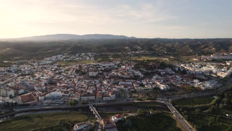Rotating-aerial-over-the-city-of-Silves-and-the-nearby-Arade-river