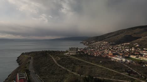 Aerial-shot-from-pedestal-in-Croatia-of-the-fortress-of-nehaj-with-a-beautiful-view-of-the-city-on-a-cloudy-day-and-to-the-horizon-we-see-the-sea-4k-60fps-drone