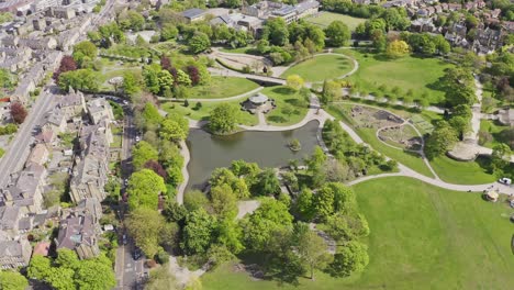 Aerial-drone-pull-back-shot-flying-over-Huddersfield-town-and-Greenhead-Park